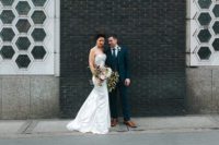 05 The groom was wearing a three-piece navy blue suit and copper shoes