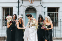 06 The bridesmaids wore mismatched black long wedding dresses, and 40s earrings from the bride’s grandmother collection tied up their looks