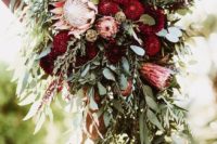 07 greenery, red dahlias and king proteas for wedding arch decor