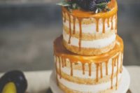 07 naked wedding cake with salted caramel drip and topped with blackberries