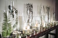 08 Greenery in tall vases and a lot of candles is a gorgeous idea, which is also very budget-friendly