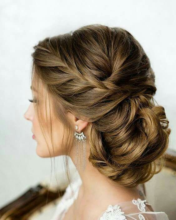 braided low side updo looks gorgeous and fits a lot of wedding styles