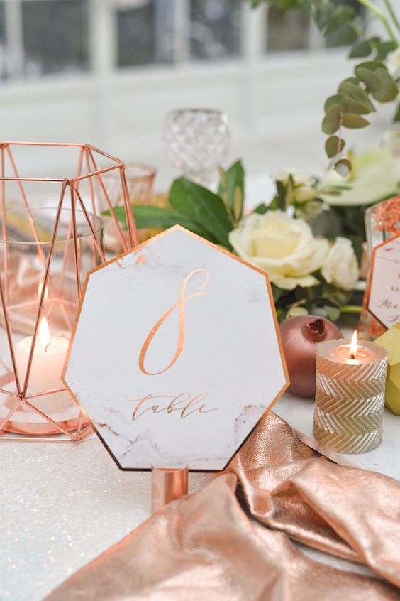 geometric marble wedding table numbers with copper detailing