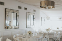 09 The reception was also decorated in all-white, with mirroring and metallic touches for a chic look