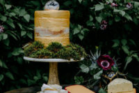 09 The wedding cake was done in yellow and covered with moss to give it a woodland-inspired look
