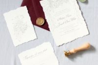 09 neutral wedding invitations with burgundy envelopes