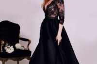 10 a black lace deep V-neck wedding dress with long sleeves and a plain full skirt