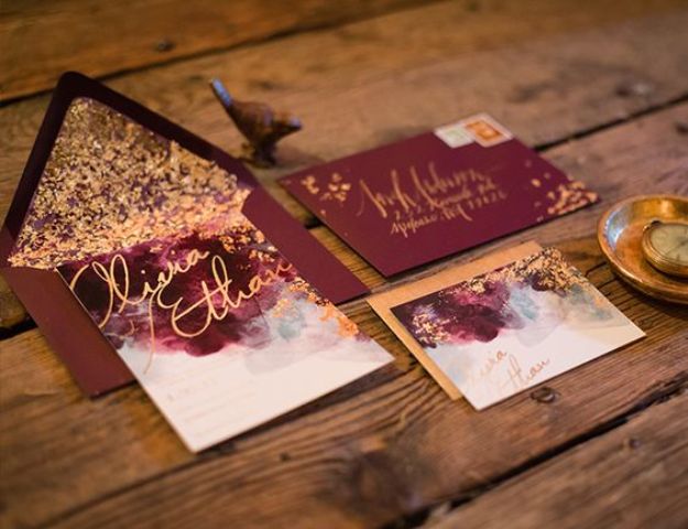 burgundy and gold leaf invitation suite with calligraphy