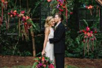11 lush berry-hued floral wedding backdrop