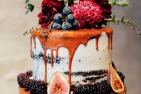 11 semi naked wedding cake with caramel drip, figs, blackberries, grapes and fresh flowers