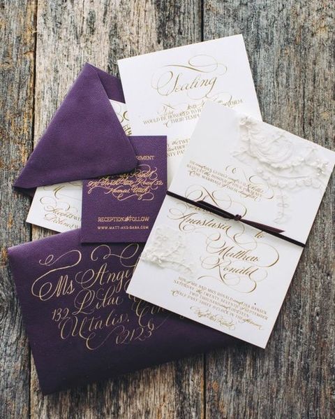 deep purple and gold calligraphy wedding stationary