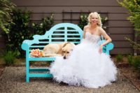 a strapless lace bodice wedding ballgown with a feather skirt is a perfect solution for a modern glam bride