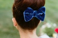14 a blue velvet bow for the bridal hairstyle will add a cute girlish touch to your look