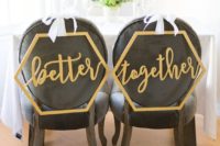 15 a gold calligraphy hexagon wedding chair signs contrast black chairs