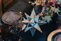 15 dark florals and 3D shaped star decorations for a starry table setting
