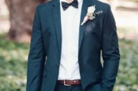 16 a dark grey wedding suit with a white shirt, a black bow tie