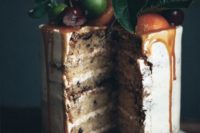 16 chocolate chip wedding cake with caramel and bourbon drip, fresh apples and cherries