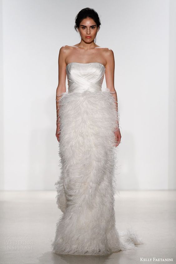 strapless draped bodice wedding dress with a fluffy feather skirt