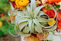 17 bold fall bouquet with billy balls, air plants and orange ranunculus