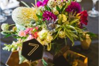 17 metallic hexagon tiles for accentuating a centerpiece and hexagon table numbers