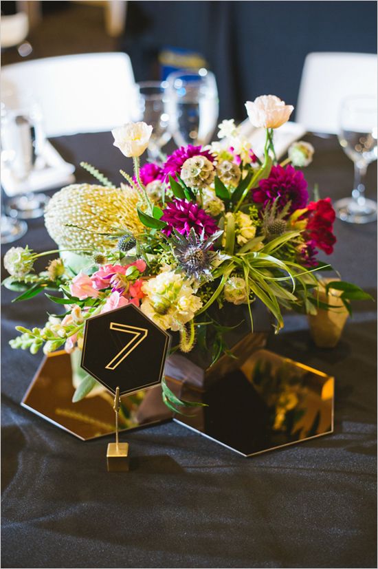 metallic hexagon tiles for accentuating a centerpiece and hexagon table numbers