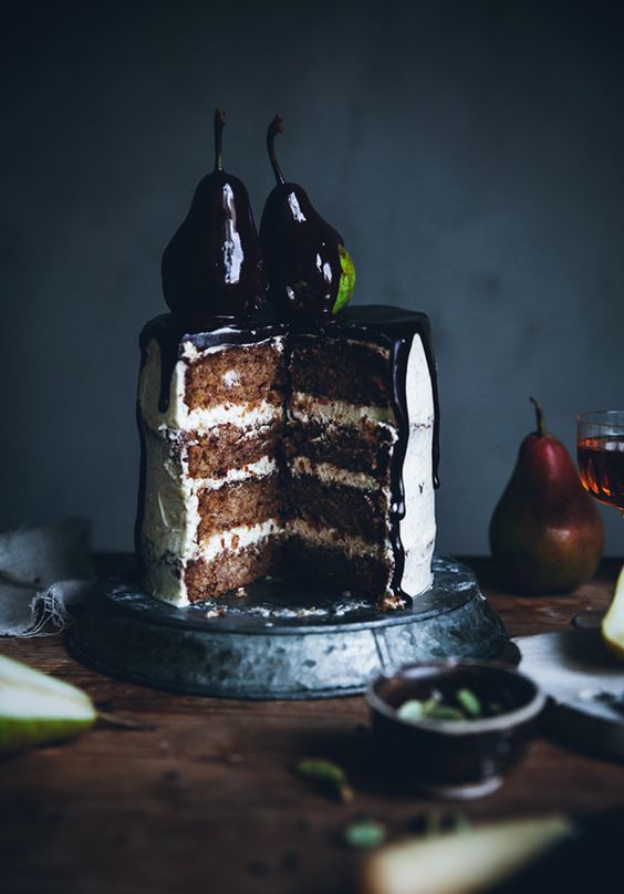 pear cardamom cake with brown butter frosting and chocolate drizzle
