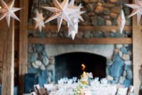 20 shining white star-shaped lamps over the reception