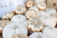 21 gilded faux pumpkins mixed with white ones for wedding decor