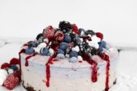 21 strawberry black currant ice cream cake topped with blueberries, blackberries, raspberries