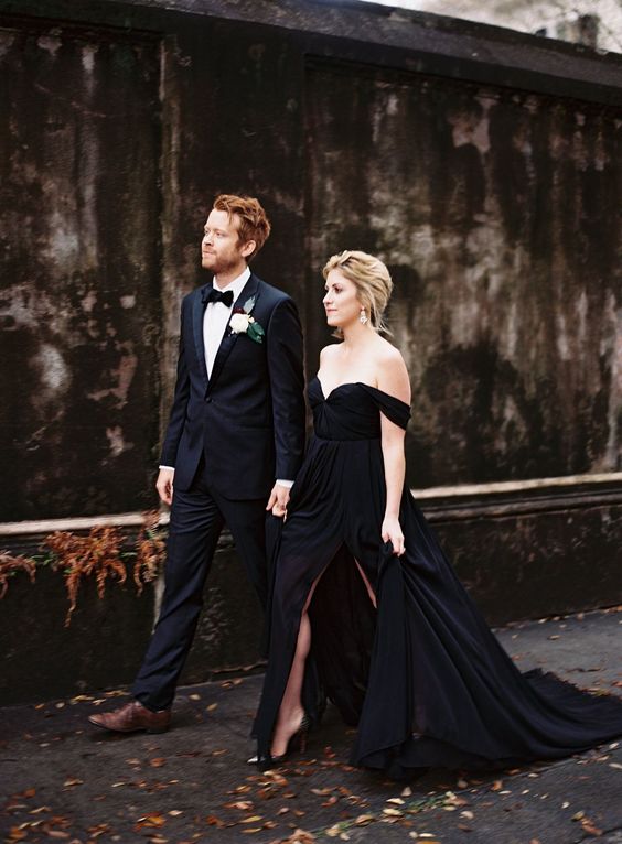off the shoulder black wedding gown with a side slit looks very chic and elegant