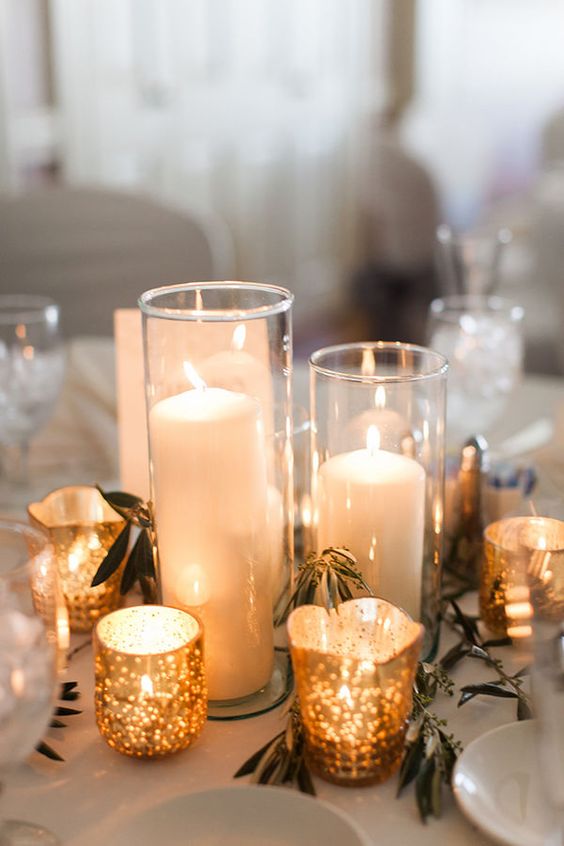 gold candle holders with transparent hurrican ones