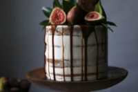 23 semi naked wedding cake with chocolate drip, fresh figs and leaves