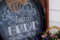 25 an oval chalkboard sign with a burlap bow