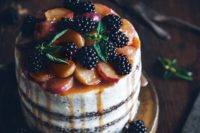 27 peach carrot cake with cream cheese frosting, blackberries, peaches and peach drip