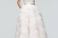 a strapless sweetheart wedding dress with a textural bodice and a feather skirt is a super glam and chic idea for a wedding