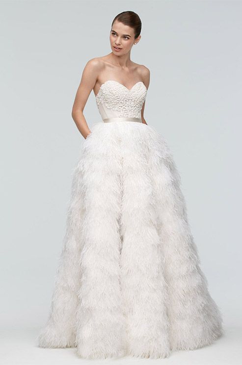 strapless sweetheart wedding dress with a textural bodice and a feather skirt