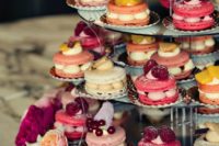 28 macaron sandwich tower with different fillings and toppers looks impressive