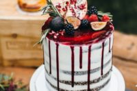 28 semi naked wedding cake with pomegranate drip, figs, blackberries, pomegranates