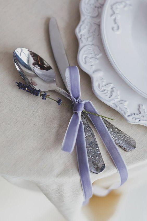 silverware with lavender-colored velvet ribbon and lavender itself looks cute
