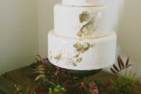 30 gold leaf white wedding cake looks simple, modern and stylish