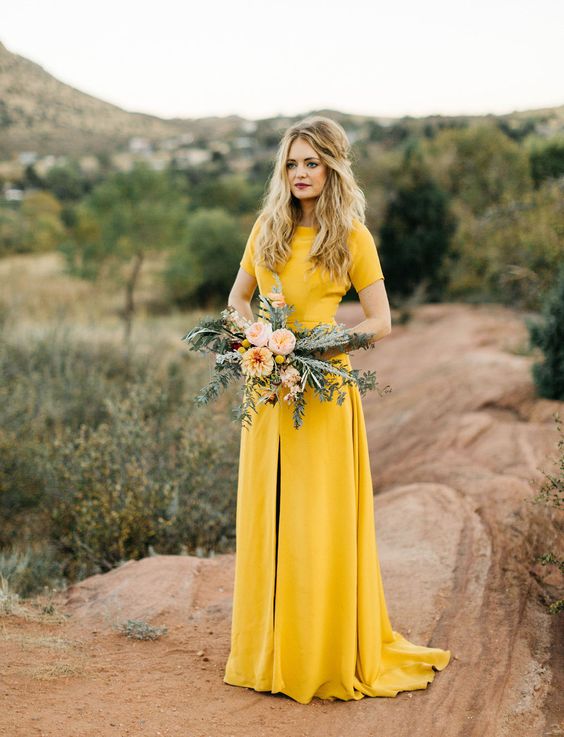 yellow short sleeve wedding dress with a front slit for a fall bride