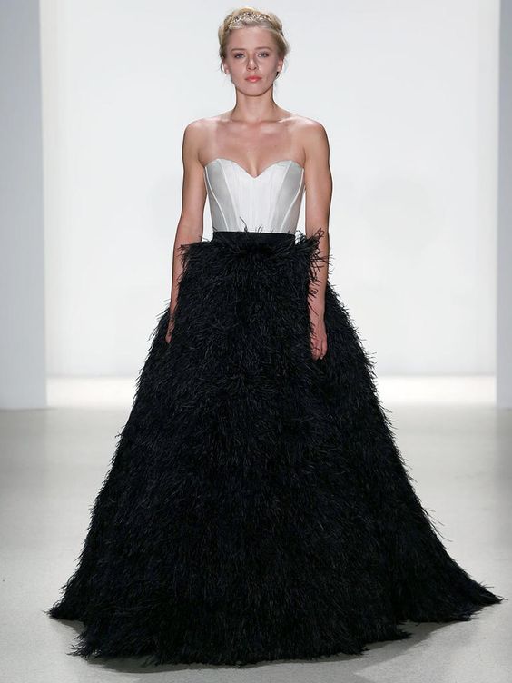 strapless sweetheart white bodice and a black feather full skirt for a daring bride