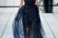33 midnight blue sparkling wedding dress with a layered skirt and a strappy bodice