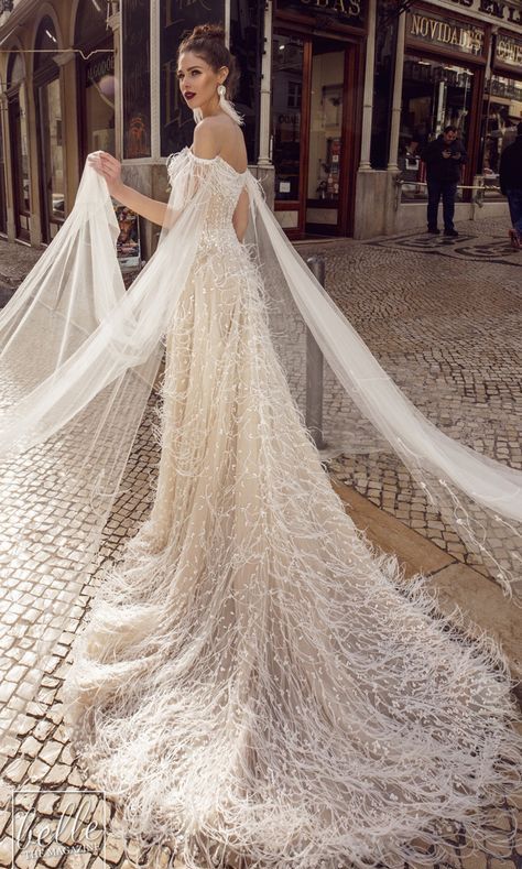 A royal inspired off the shoulder embellished and feather wedding dress with a train and a cape is a fantastic idea