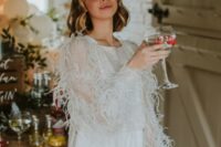 a super glam bridal look with plain pants, a sparkling embellished and feathered top are a fantastic combo