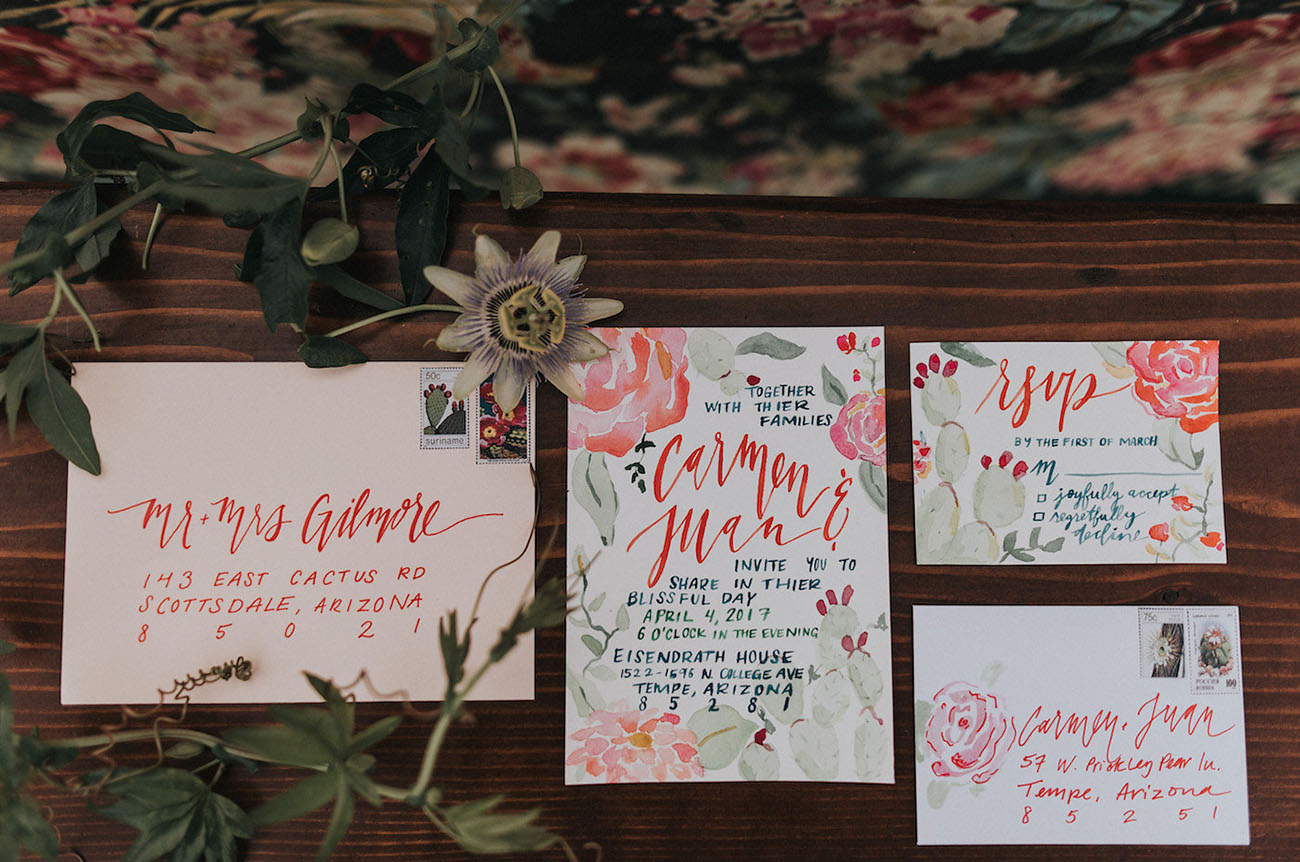 Watercolor invitation suite with red and muted green touches