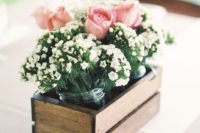 03 a pallet box with jars with white and pink blooms is a simple idea for a rustic wedding