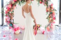 03 whimsy wedding arch of colorful balloons, greenery and flowers