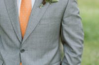 04 a grey suit, a white shirt and a printed orange tie for a chic look with a colorful touch