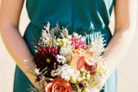 05 a teal bridesmaid’s dress and necklace, a bouquet with copper blooms remind of the fall